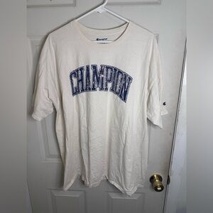 Champion Tee